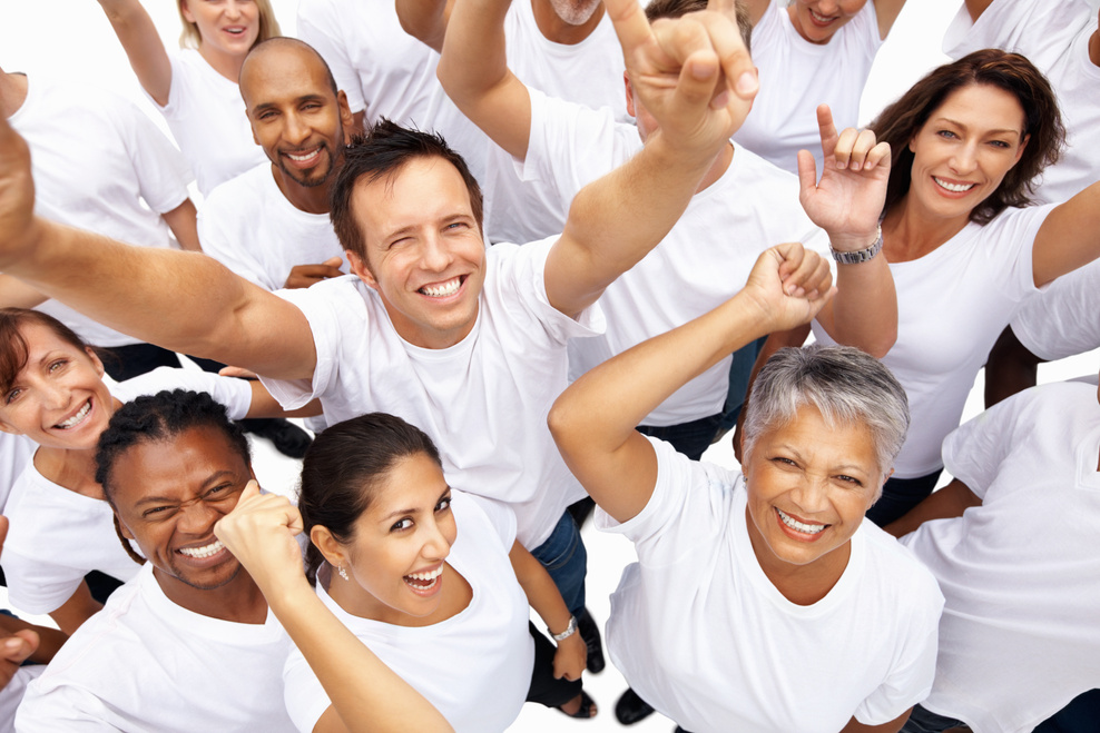 People of different generations and races cheering